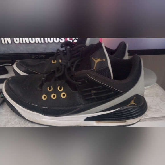 Black and Gold Men's Athletic Nike Air Jordon Sneakers